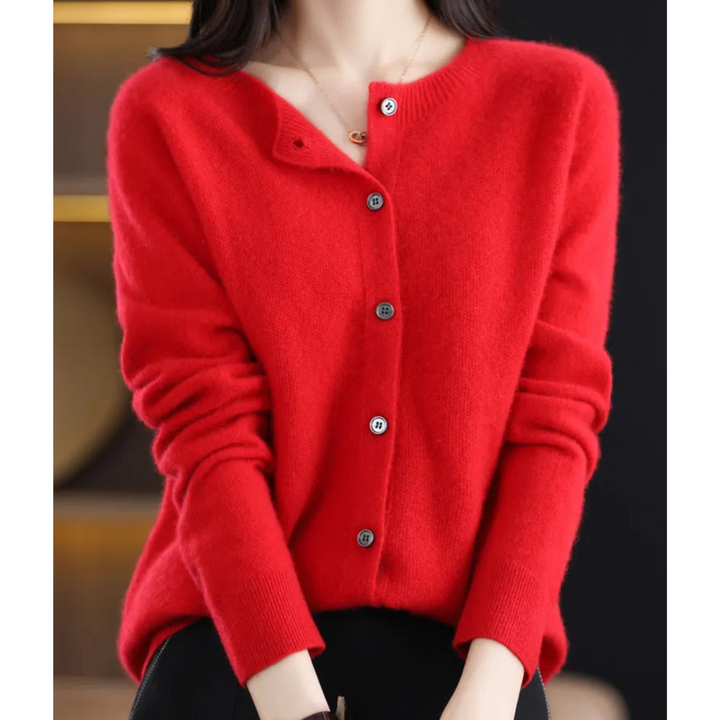 Pull femme en laine mérinos, col rond, chaud et élégant.  Parfait pour l'hiver.