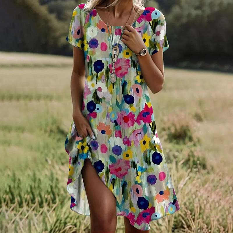"Robe fleurie élégante, coupe fluide, motif floral délicat, idéale pour occasions spéciales et garde-robe féminine."