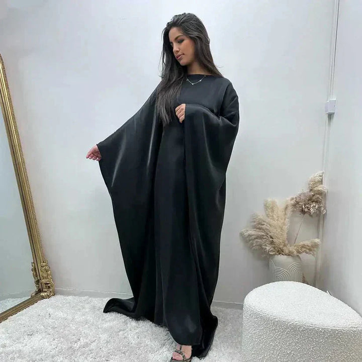 Robe longue Abaya Alina élégante et confortable, manches longues, couleur bleu ciel, idéale pour style modeste.