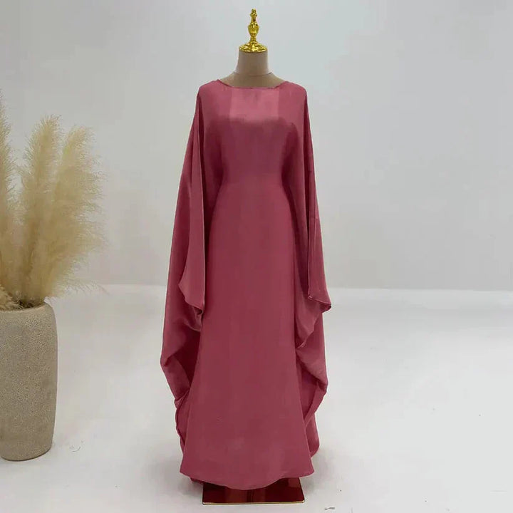 Robe longue Abaya Alina élégante et confortable, manches longues, couleur bleu ciel, idéale pour style modeste.