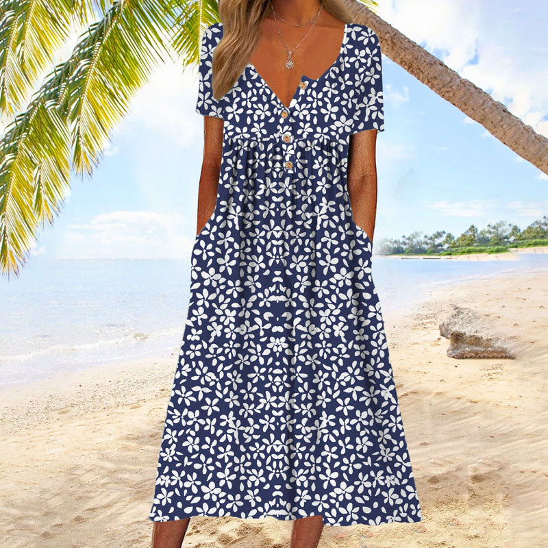 Robe midi fleurie, manches courtes, coupe fluide, imprimé floral coloré, style décontracté et élégant pour femmes.