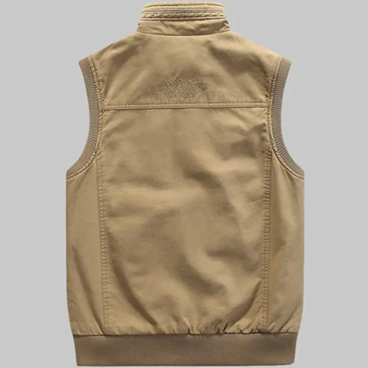 Veste homme tactique multipoches, style vintage robuste. Idéale pour l'aventure.