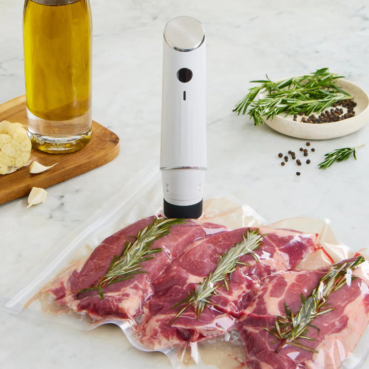 Appareil de mise sous vide Siolite, design compact et élégant, idéal pour toute cuisine moderne.