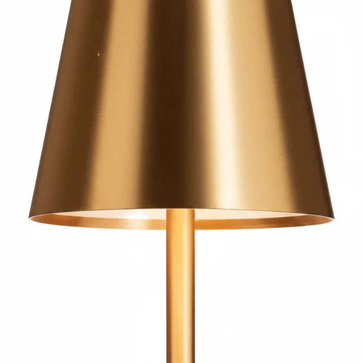 Élégante lampe de table LED portable, rechargeable, avec éclairage d'ambiance à intensité réglable.