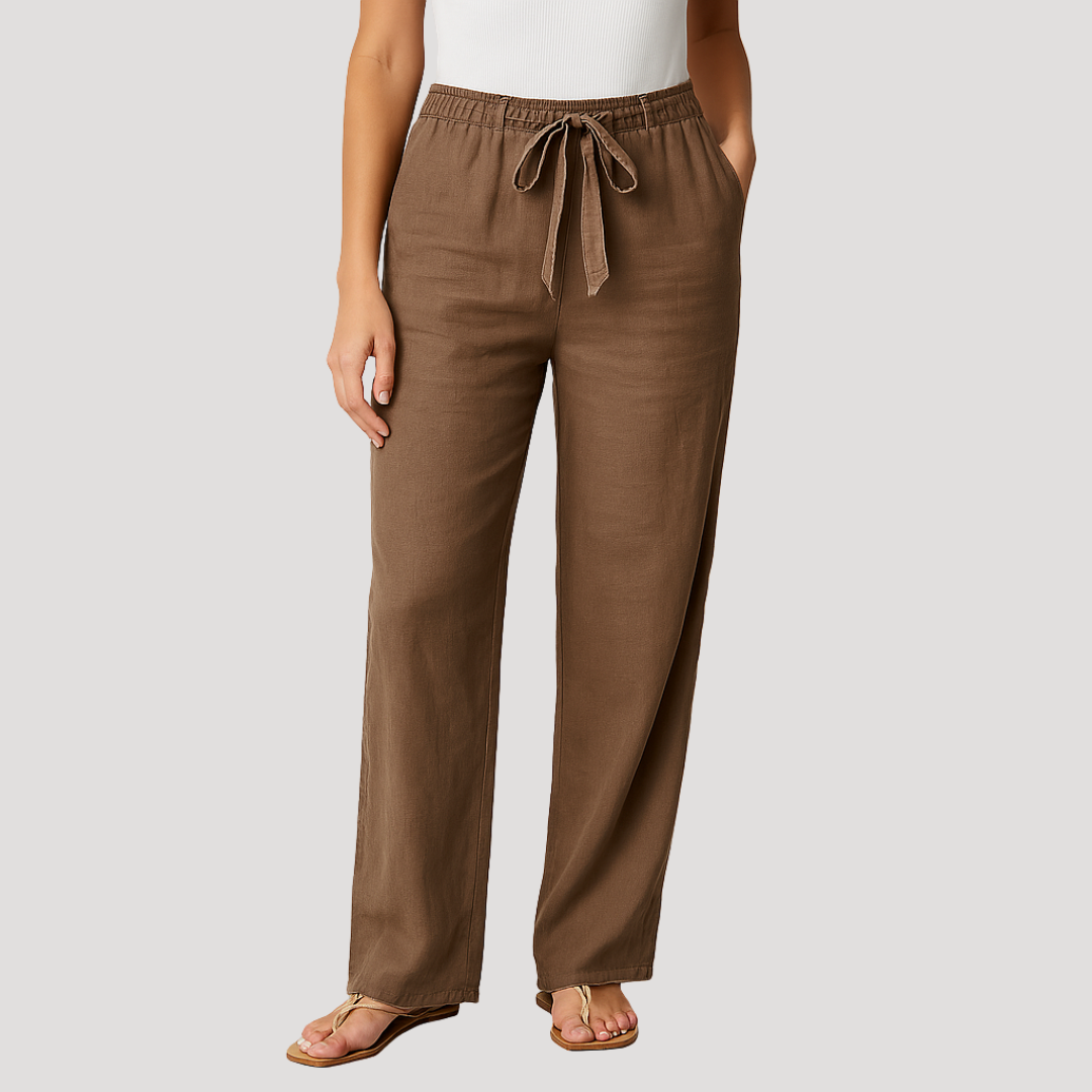 Pantalon femme fluide en lin blanc cassé, taille élastique pour un confort optimal. Parfait pour un look d'été décontracté.