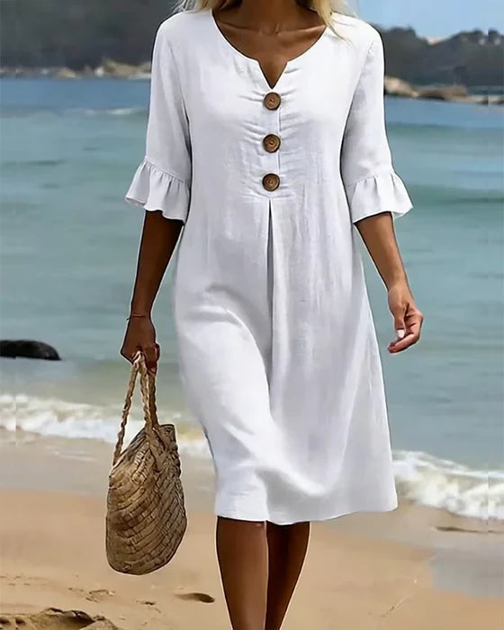 Robe estivale fluide femme en coton lin, boutonnée, avec jolies manches volantées. Parfaite pour l'été.