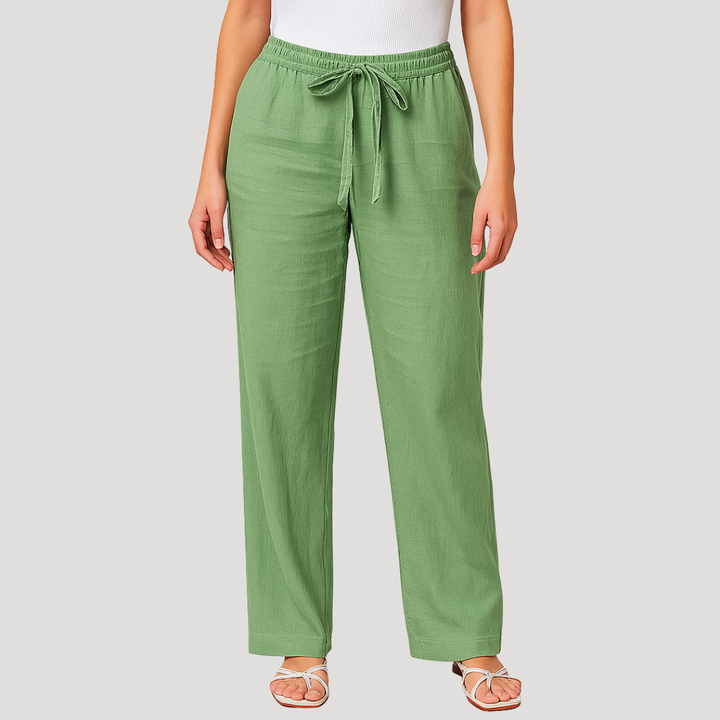 Pantalon d'été femme en lin naturel respirant. Coupe droite et taille élastique, idéal pour la chaleur.