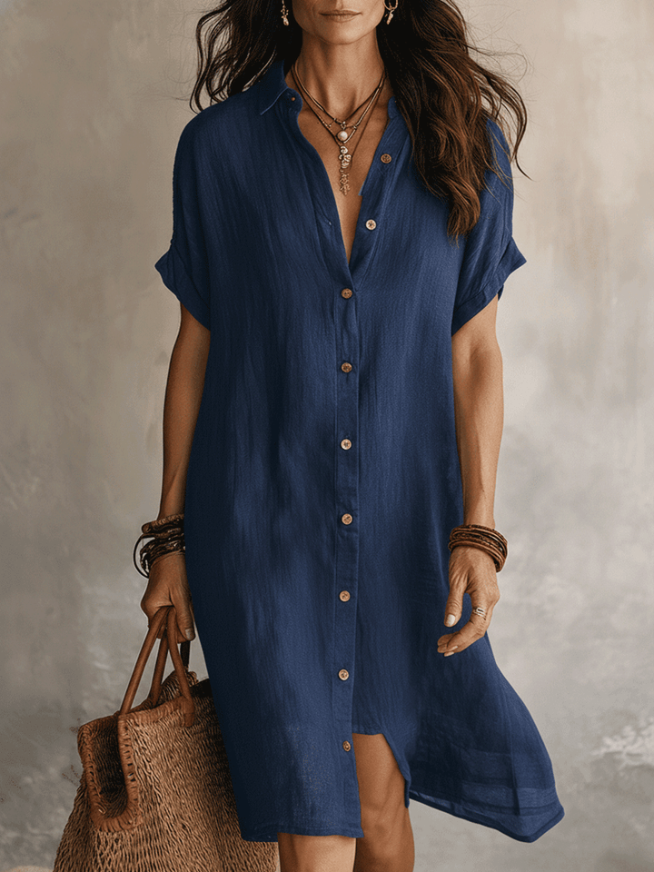 Robe midi boutonnée pour femme, coupe chemise, alliant élégance et confort. Idéale pour un style chic et polyvalent.