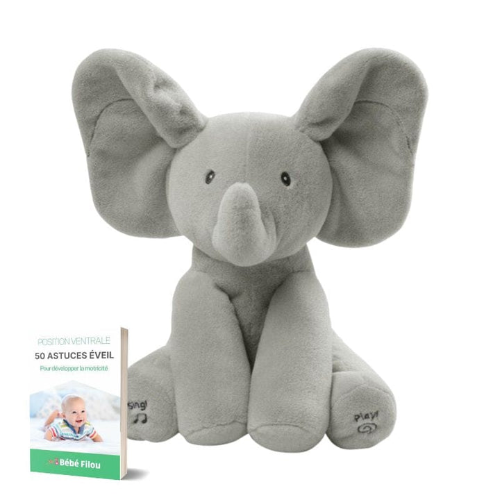Peluche éléphant Bibou, jouet d'éveil musical pour bébé, conçu pour le développement auditif et tactile.