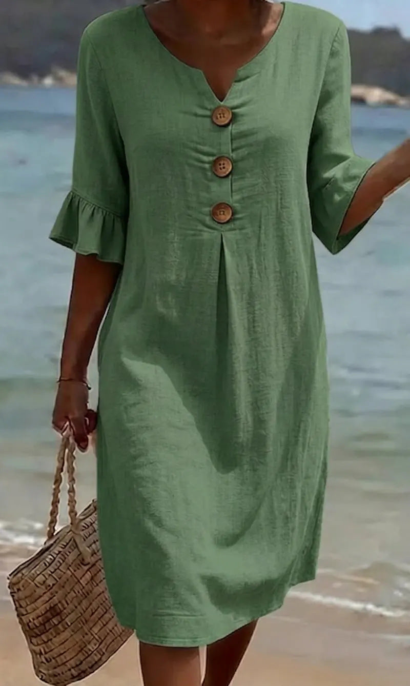 Robe midi femme en coton lin fluide, boutonnée, manches volantées. Silhouette élégante pour l'été.