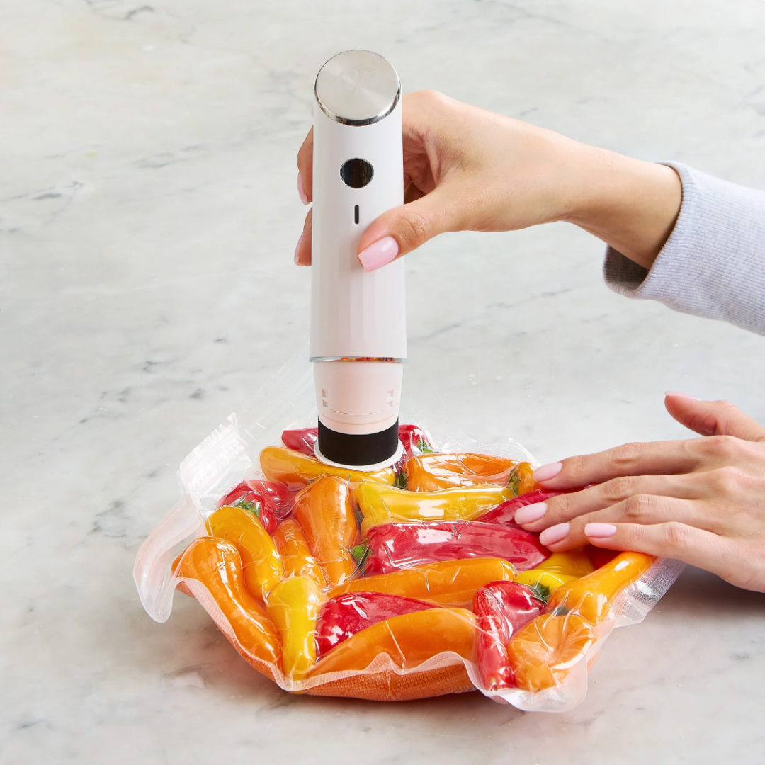 Appareil sous-vide alimentaire Siolite, parfait pour viandes, légumes, fruits et plats préparés.