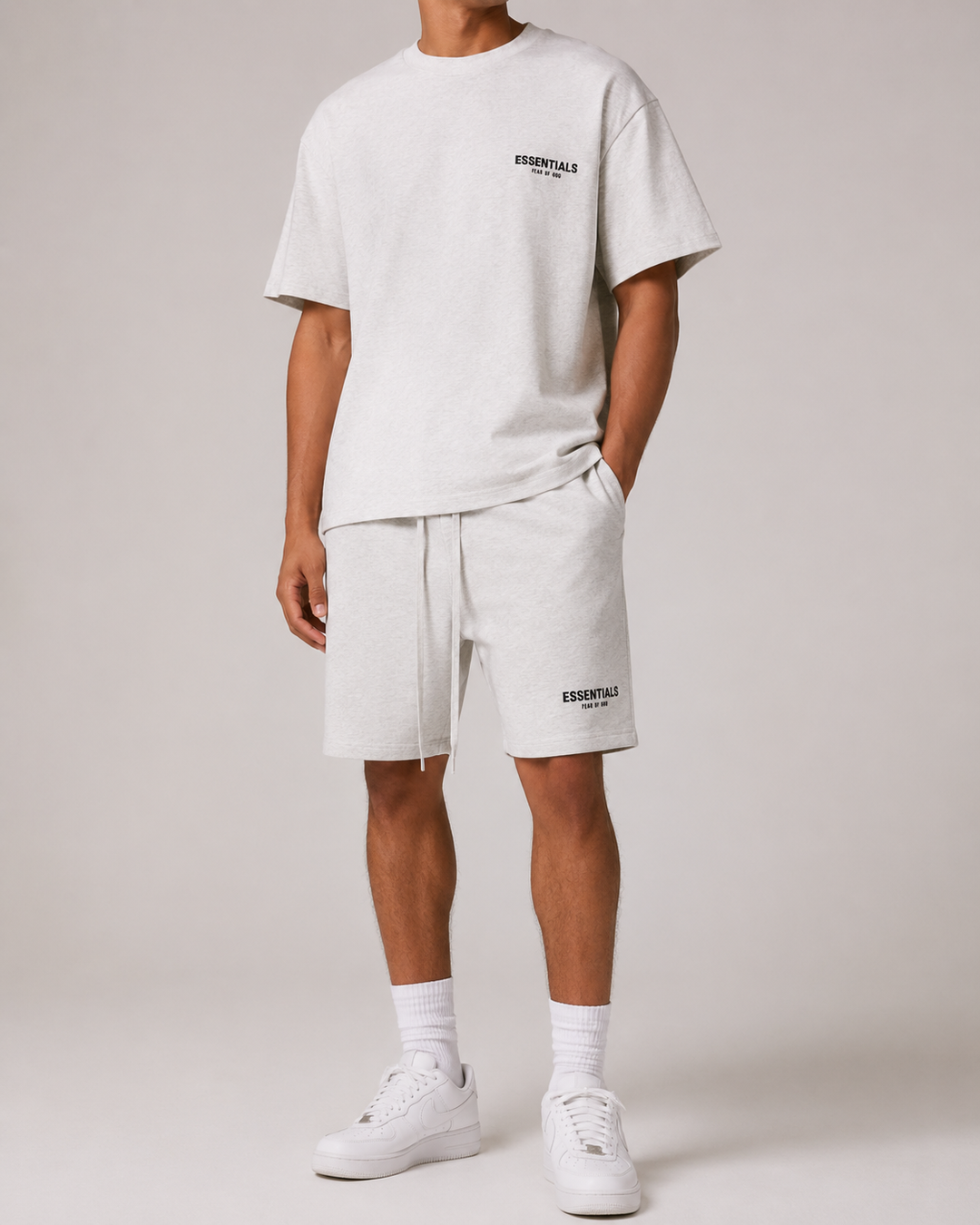 Vêtements d'été homme : Chemise à manches courtes et short en tissu léger, parfait pour la chaleur.