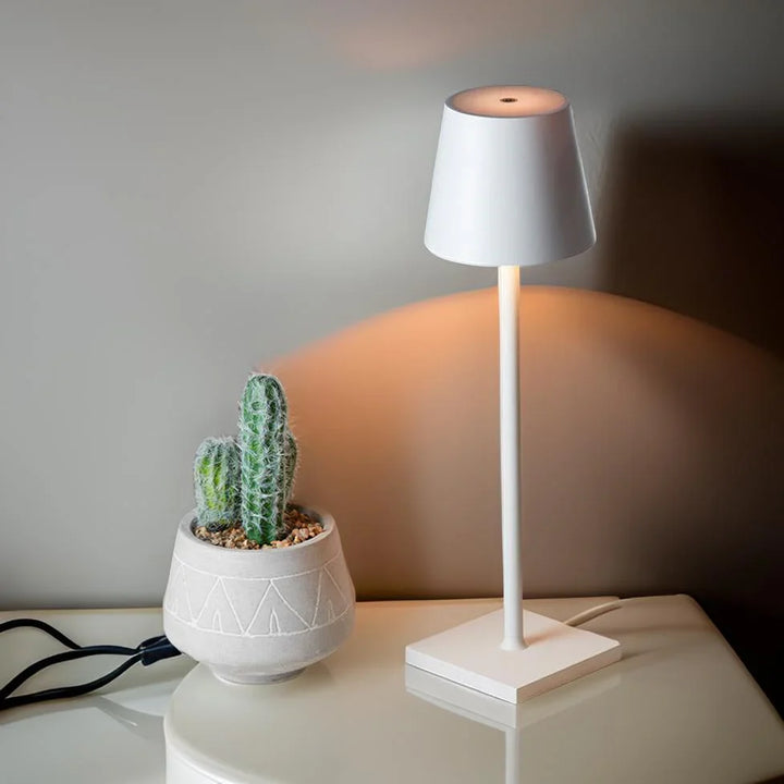 Éclairage LED sans fil, rechargeable, intensité réglable, pour une ambiance cosy intérieure/extérieure.