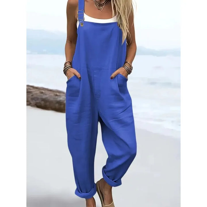 Jumpsuit femme ample style décontracté, motif artistique rétro, jambe large et sans manches, idéale été printemps.