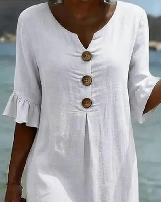 Robe de plage femme en coton lin, légère et boutonnée, avec manches volantées. Idéale pour les vacances.