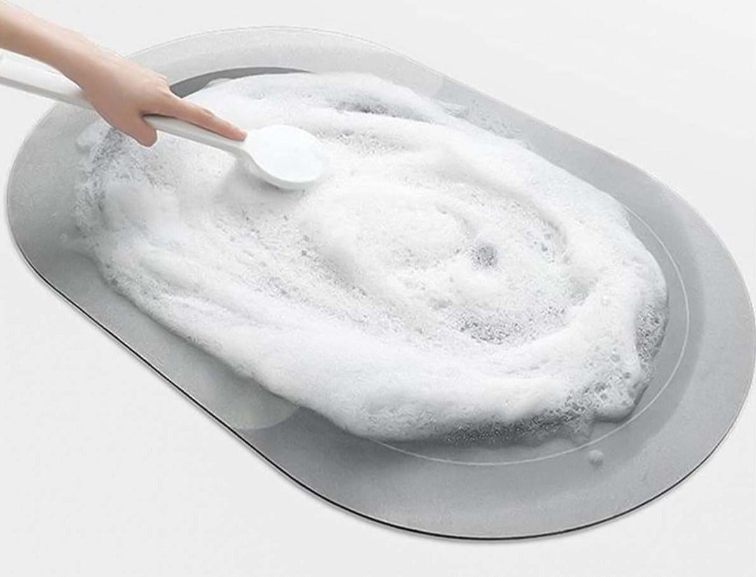 Absorbent, quick-drying bath mat.  Non-slip oval design for a safe, elegant bathroom.