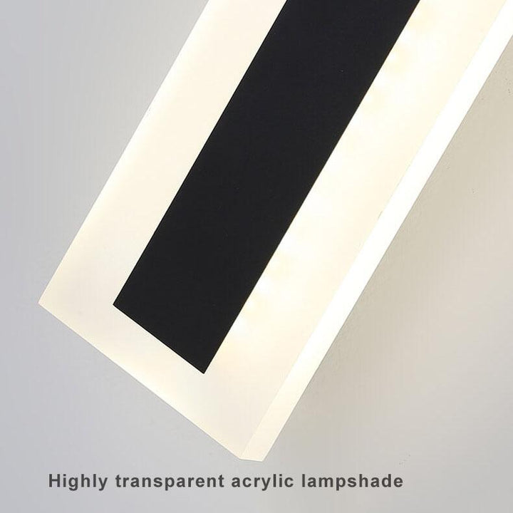 Applique d'extérieur LED moderne, design minimaliste, illumine la façade avec une lumière douce et un style linéaire élégant.