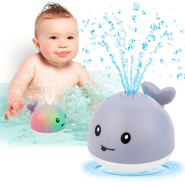 "Baleine de bain enfant LED interactive avec jets d'eau, effets lumineux multicolores et design ludique pour le bain."