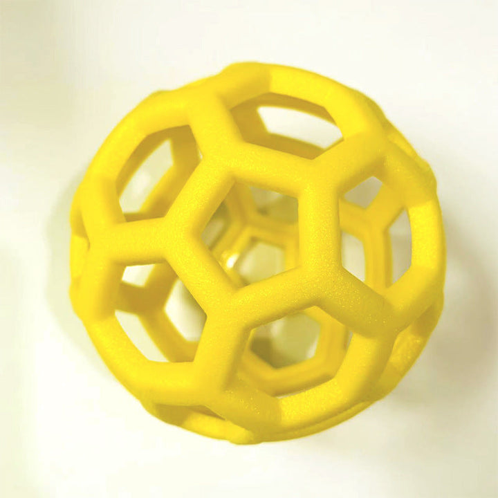 Balle interactive pour chien, durable et stimulante.  Favorise le reniflement et le jeu. Couleurs vives.