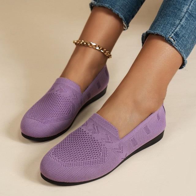 Chaussures plates femme, design moderne, respirantes, parfaites pour le confort quotidien.