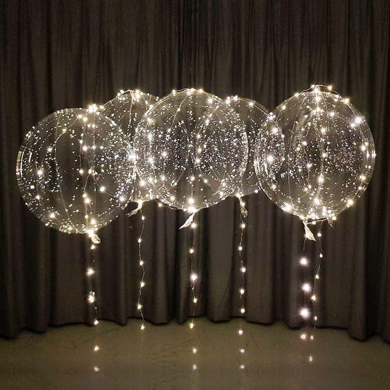 Ballons LED lumineux pour fêtes.  Ambiance féérique garantie.  Décoration évènement.