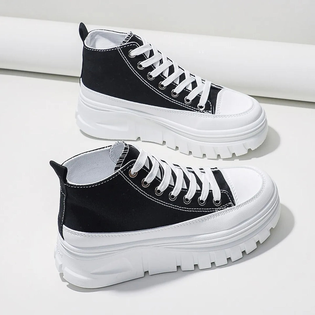 Baskets blanches femme tendance à semelle épaisse, idéales pour un style décontracté et un confort optimal au quotidien.