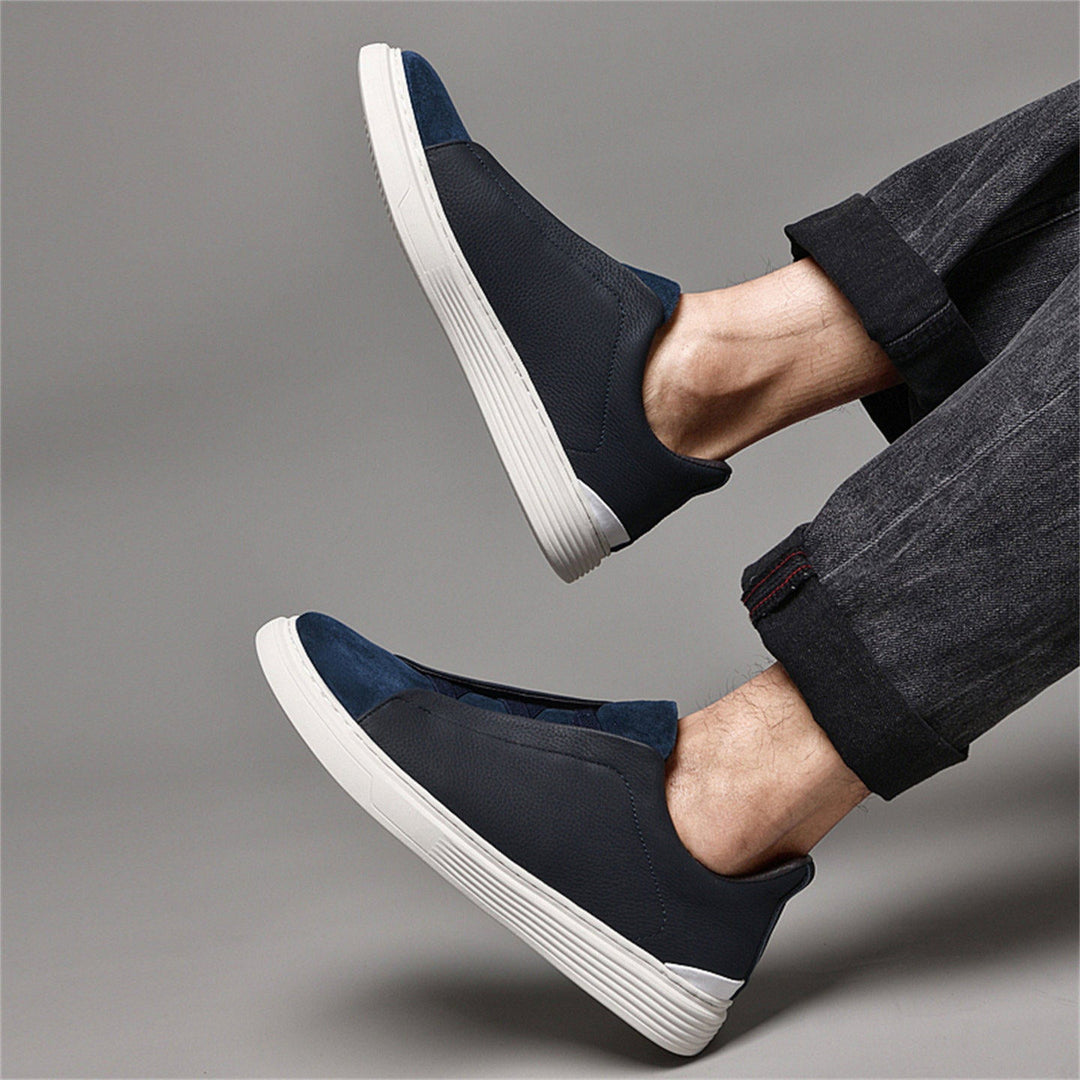 Baskets hommes avec lacets élastiques et semelle caoutchouc, offrant confort et style pour le quotidien.