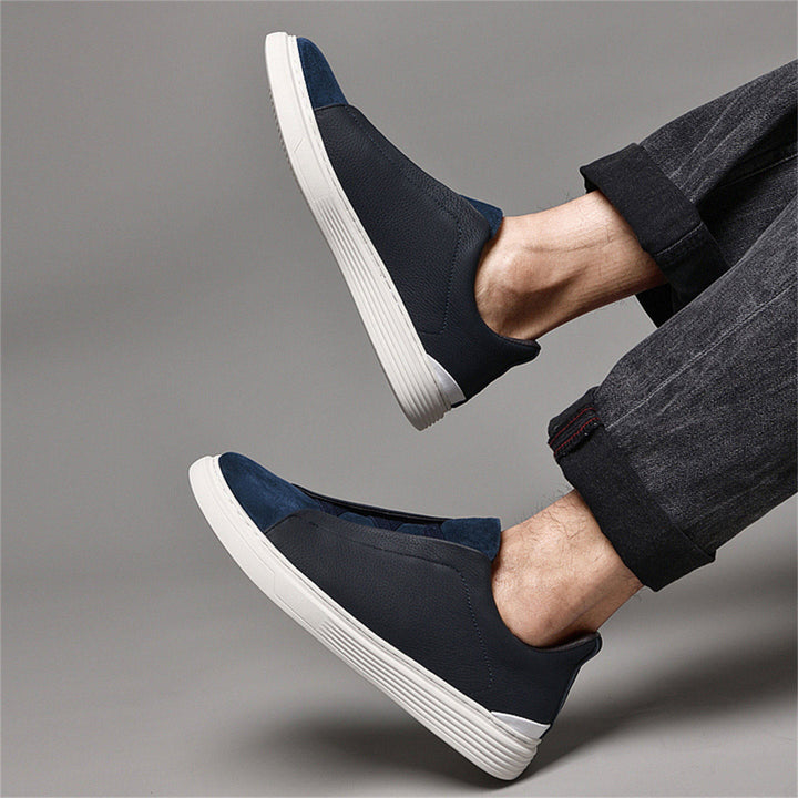 Baskets hommes avec lacets élastiques et semelle caoutchouc, offrant confort et style pour le quotidien.