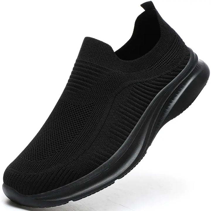 Vue latérale baskets de marche hommes, légères, respirantes avec un amorti supérieur pour un confort optimal.