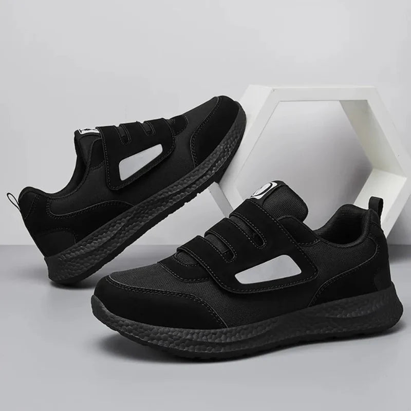 Semelle antidérapante de baskets de marche orthopédiques larges, assurant stabilité et confort pour hommes et femmes.