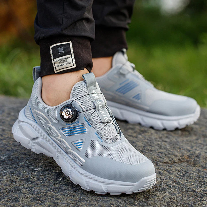 Paire de baskets de sécurité pour hommes, légères et confortables, avec embout acier et technologie anti-perforation.