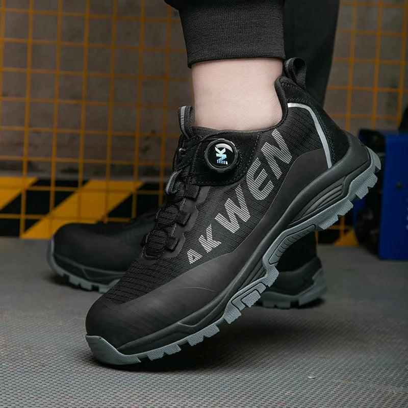 Chaussures de sécurité universelles pour hommes et femmes, baskets respirantes orange/noir avec embout acier protecteur.