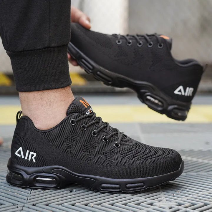 Chaussures de protection robustes pour hommes avec embout acier et semelle résistante, garantissant sécurité et durabilité.
