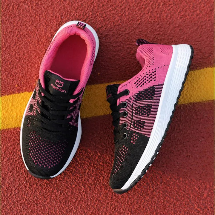 Baskets running unisexes en maille respirante ultra-légères, offrant un confort idéal pour le sport et le quotidien.