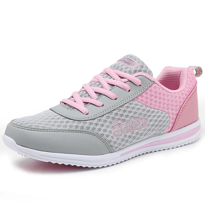 Chaussures sportives femme avec maille respirante et semelle antidérapante, idéales pour le style et la sécurité.