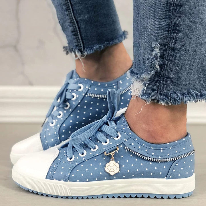 Chaussures baskets femme respirantes avec semelle confort et soutien optimal pour le sport et la marche.
