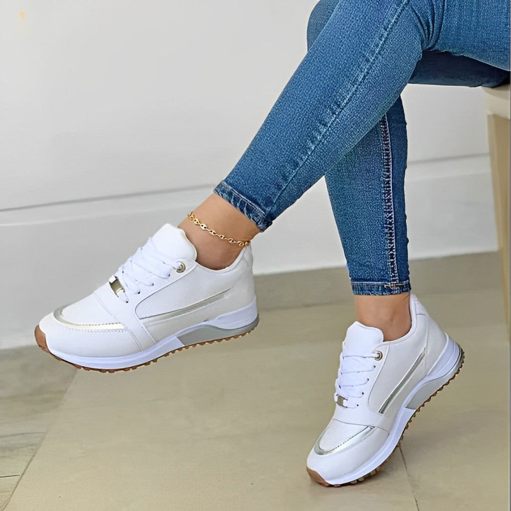 Baskets femme élégantes et confortables, design moderne, couleur beige, parfaites pour un style chic et décontracté.