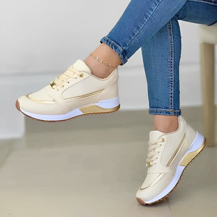 Baskets femme élégantes et confortables, design moderne, couleur beige, parfaites pour un style chic et décontracté.