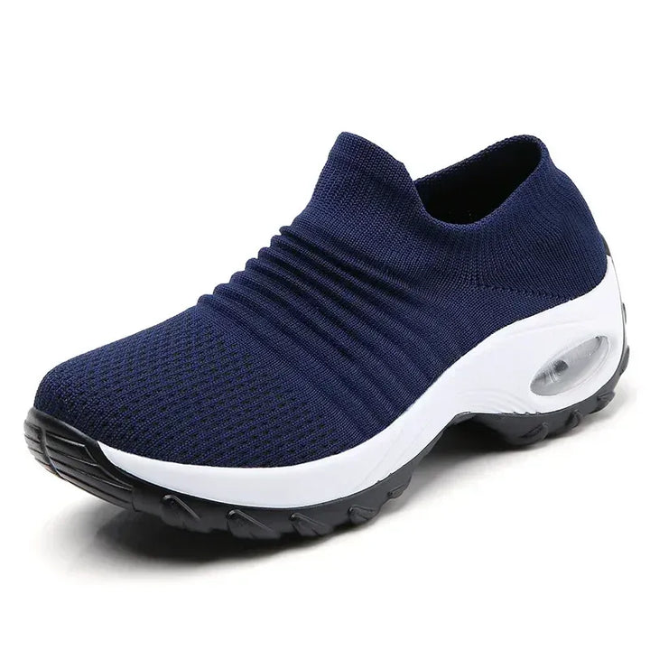 Baskets confortables femme à coussin d'air et talon compensé, design maille respirante, parfaites pour la marche.
