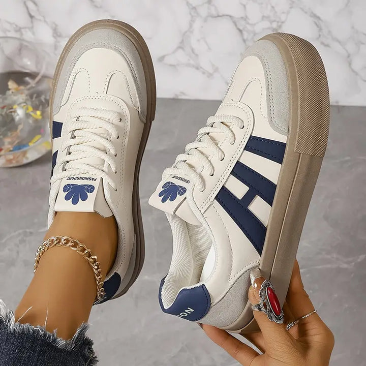 Baskets femme tendance: design élégant et confortable.  Idéales pour tous les styles.