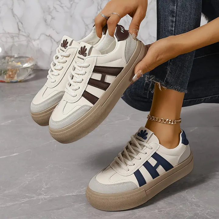 Baskets femme tendance: design élégant et confortable.  Idéales pour tous les styles.