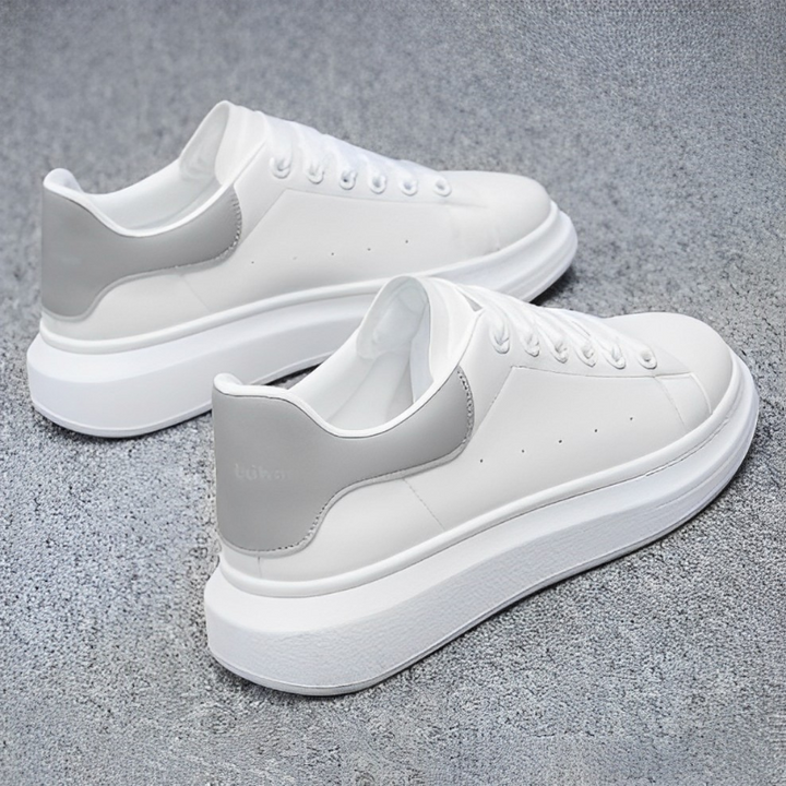 "Baskets homme modernes à semelle épaisse blanche, confort optimal et style audacieux pour allure urbaine."