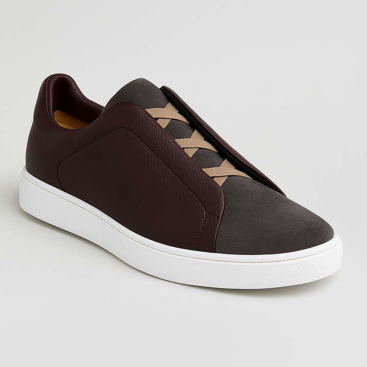 "Baskets homme premium confort moderne, design épuré, polyvalentes, idéales pour style quotidien, accent noir et blanc."