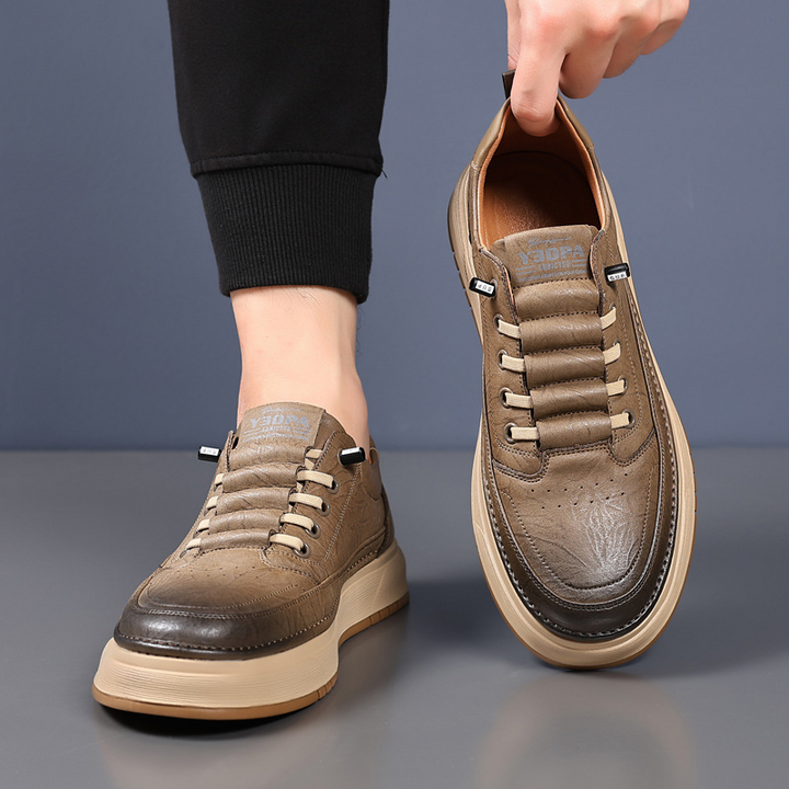 Baskets modernes homme, mode masculine, confort supérieur pour la marche quotidienne.