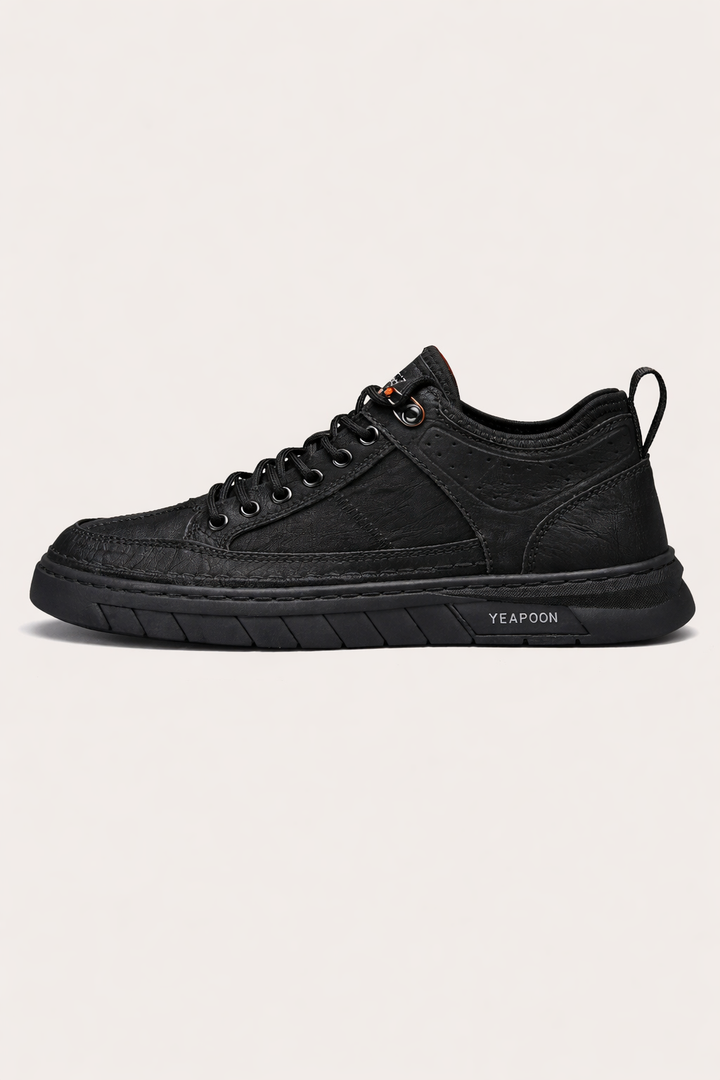 Baskets hommes noires effet cuir, style urbain décontracté, garantissant confort et robustesse.