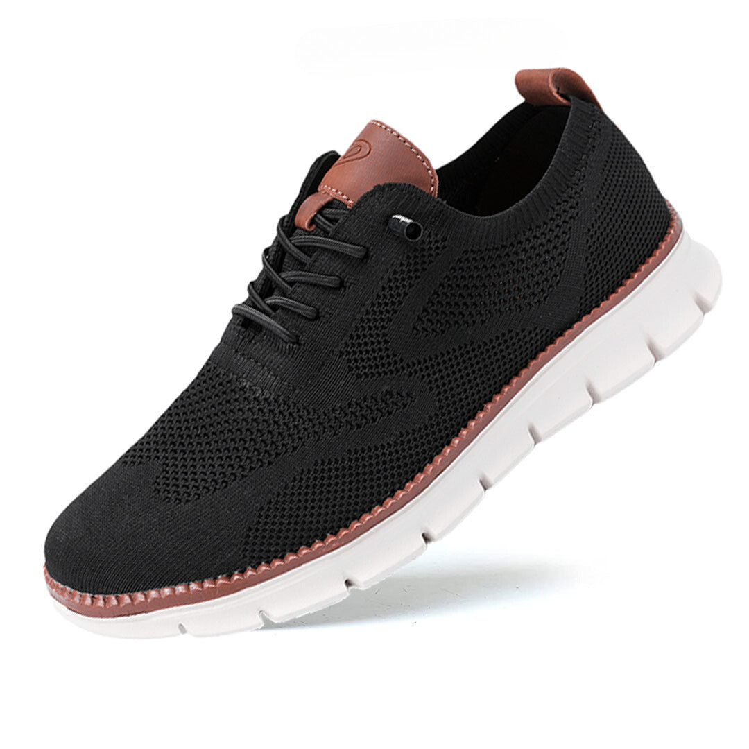 Paire de baskets hommes tout-terrain, au design moderne et facile d'entretien, pour un style actif.