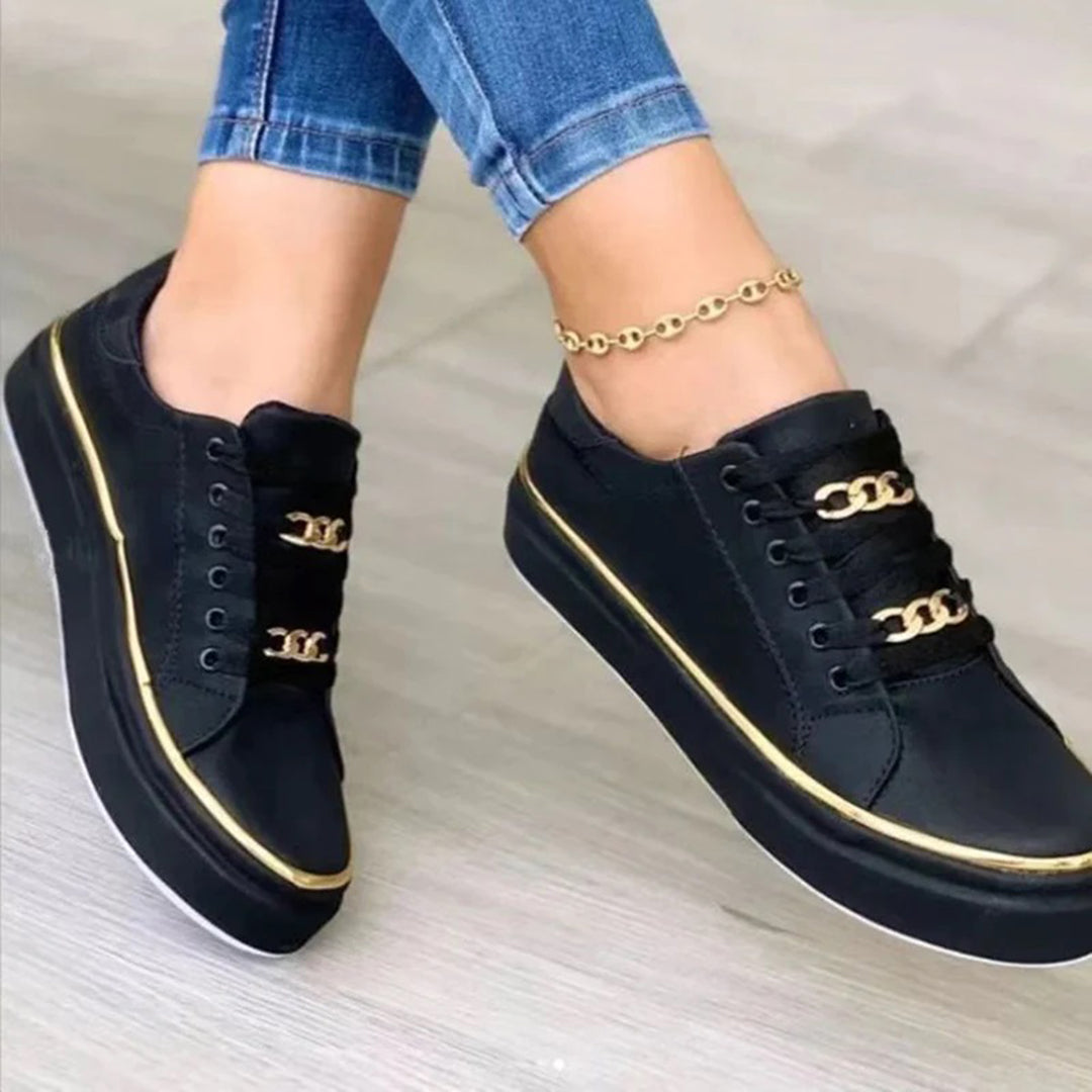 Baskets dorées Nina, chaussures modernes femme, idéales pour un style urbain et chic.
