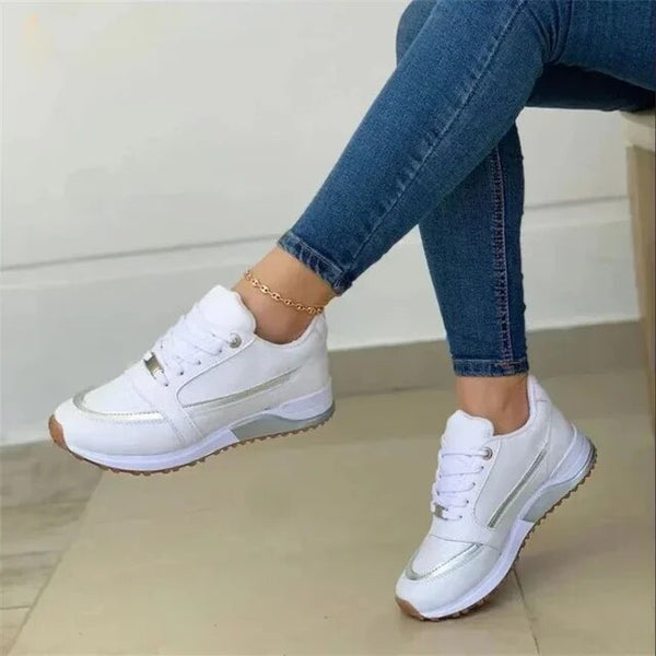 Sneakers Michelle femme, style actif et décontracté, offrant confort optimal et polyvalence au quotidien.