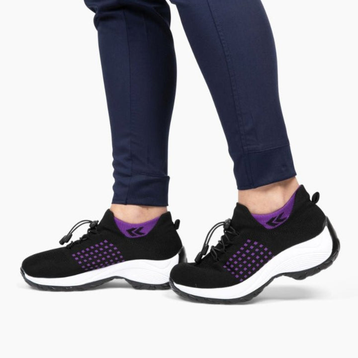 "Baskets orthopédiques femme confortables, boîte à orteils large pour soulagement hallux valgus, vue de profil."