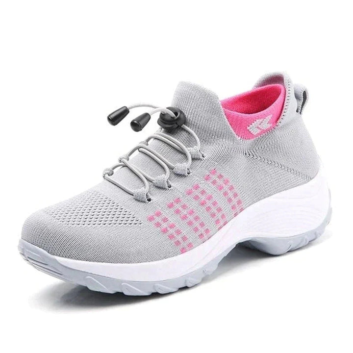 "Baskets orthopédiques femme confortables, boîte à orteils large pour soulagement hallux valgus, vue de profil."